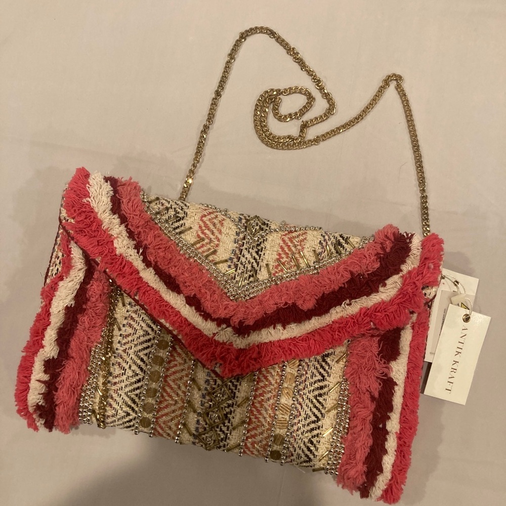 Beautiful woven Anika Kraft purse